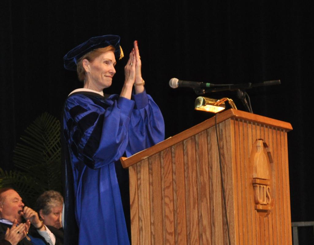 Chancellor Koch applauds graduates at the 2012 UIS Commencement Ceremony.