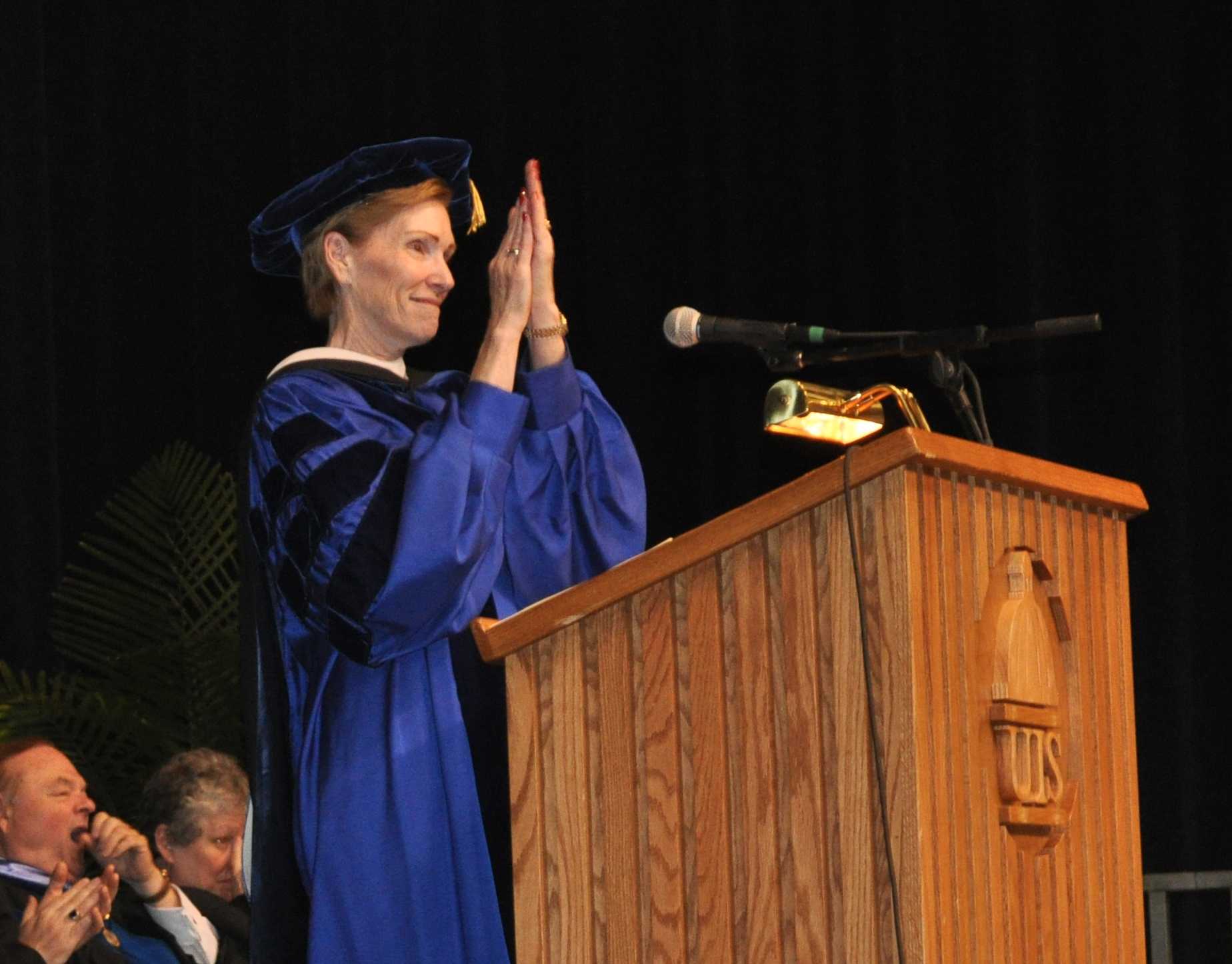 Chancellor Koch applauds graduates at the 2012 UIS Commencement Ceremony.