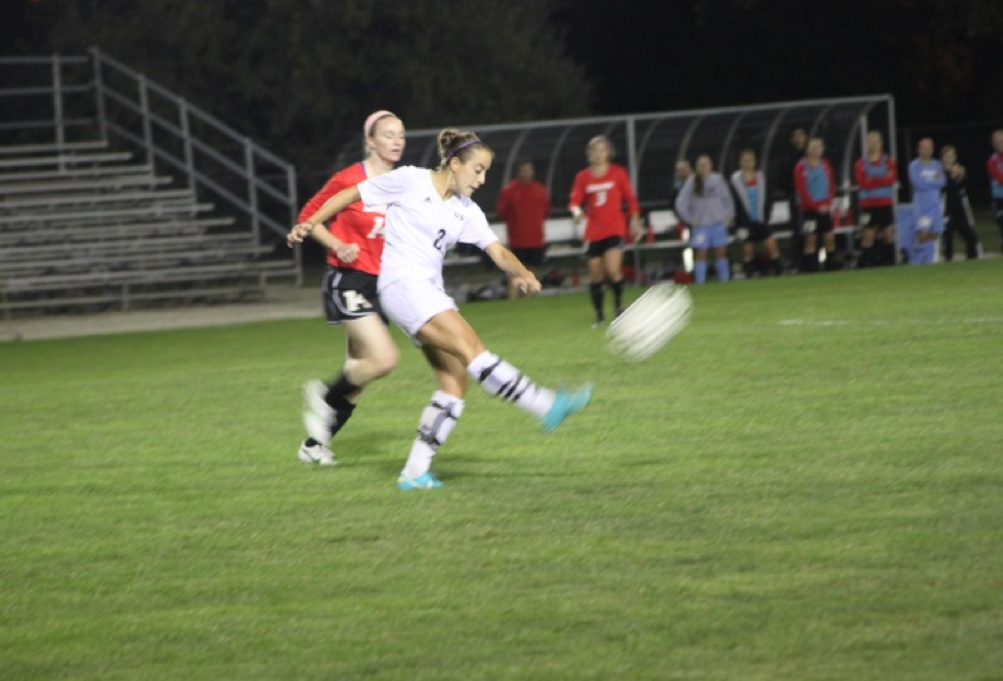 UIS Midfield, Erin Egolf kicks the ball during Friday's game versus Drury.