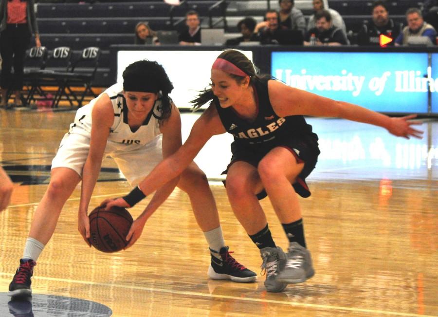 Morgan Knorr struggles to keep the ball out of Eagle hands