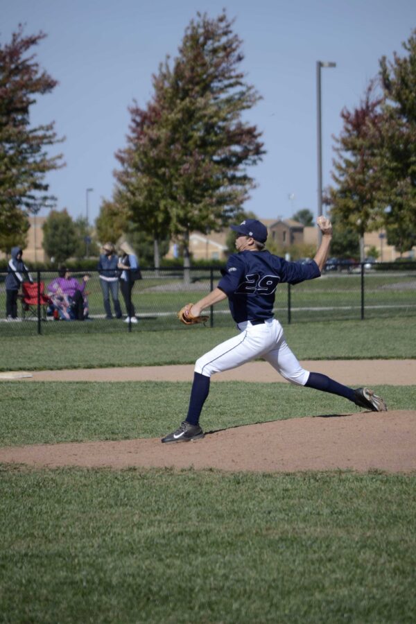 Gunnar Kay fires a pitch for the Navy Prairie Stars team