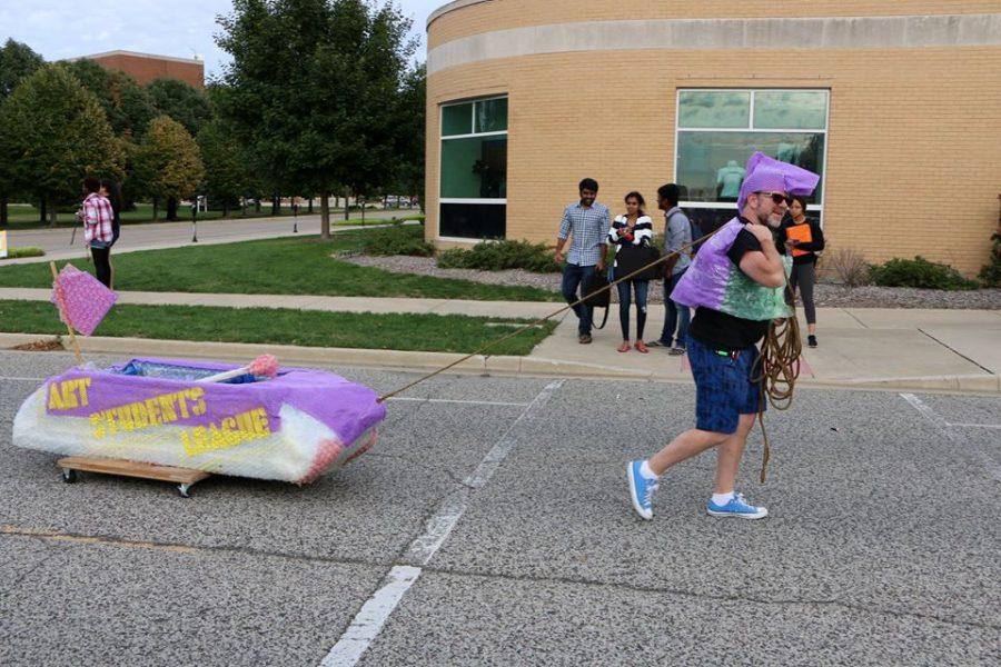 Gebhardt pulls a float during the UIS Homecoming Parade.