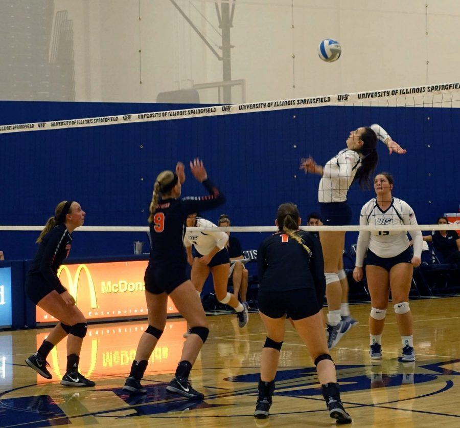 Alli Splitt moves to hammer the ball into Greenville territory.