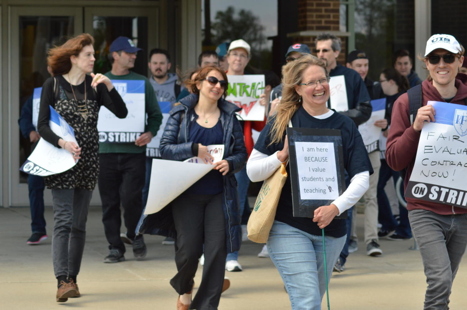 UIS faculty and supporters demonstrate outside of UHB