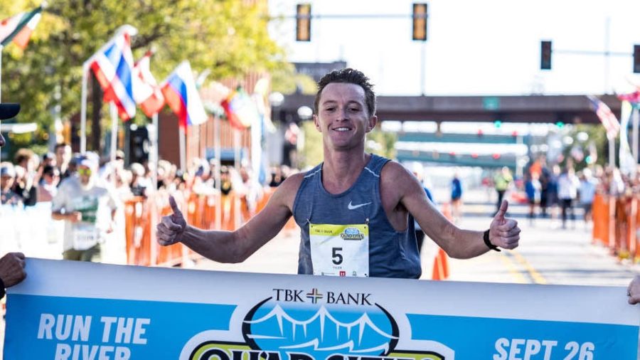 Tyler Pence crossing the finish line | Photo Credit: Pence Talks Marathon Win, Looking At The Positives [INTERVIEW] · NewsKudo