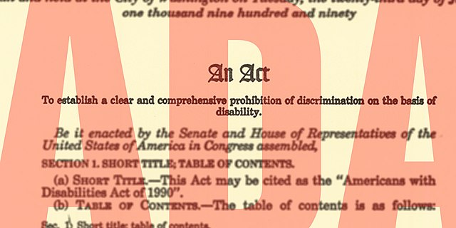 An+excerpt+of+the+ADA+Compliance+Act+%7C+Photo+credit%3A+Michigan+Lt.+Governor%2C+CC+Public+Domain+via+Wikimedia+Commons