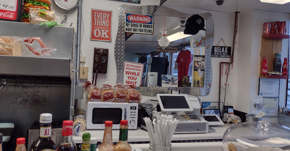 The overstuffed counter at White Spot Cafe | Photo credit: Zachary Boblitt 