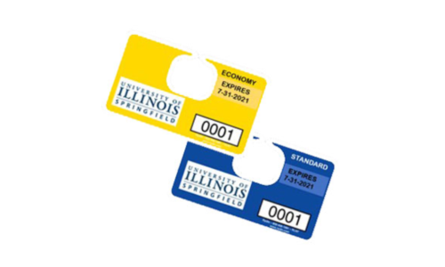 UIS parking tags have yellow tags for economy lot access and blue tags for “Standard” spaces, which cost more | Photo credit: UIS