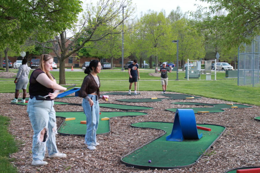 UIS Students playing golf at the Block Party | Photo Credit: Bwayisak Tanko