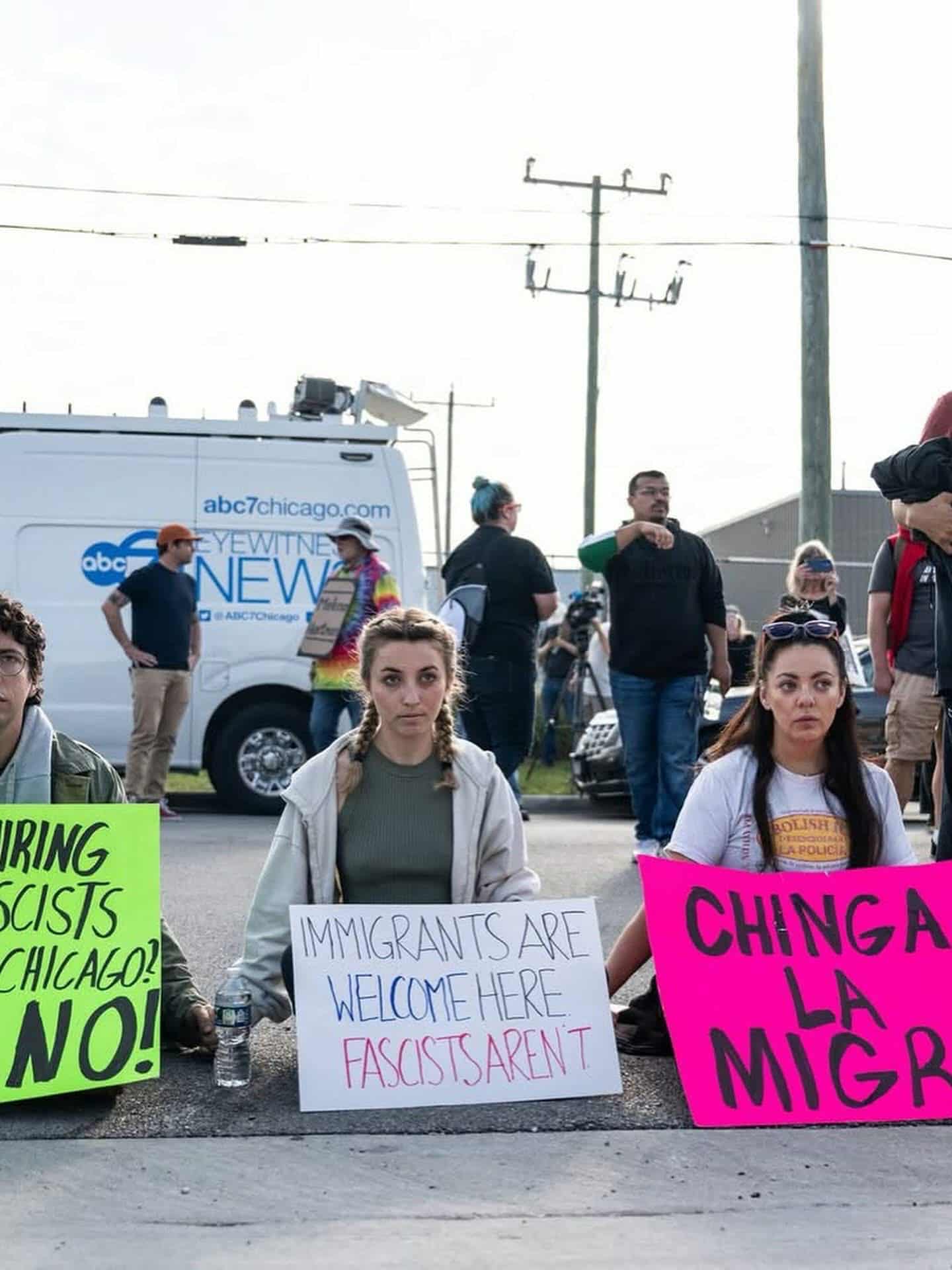 Protesters demonstrate with signs outside of an ICE detention facility in Broadview, Illinois, September 12th, 2025. Demerike Palacek (right) is a hispanic veteran and one of several congressional candidates who have been directly involved in protesting Operation Midway Blitz. Photo by Paul Goyette