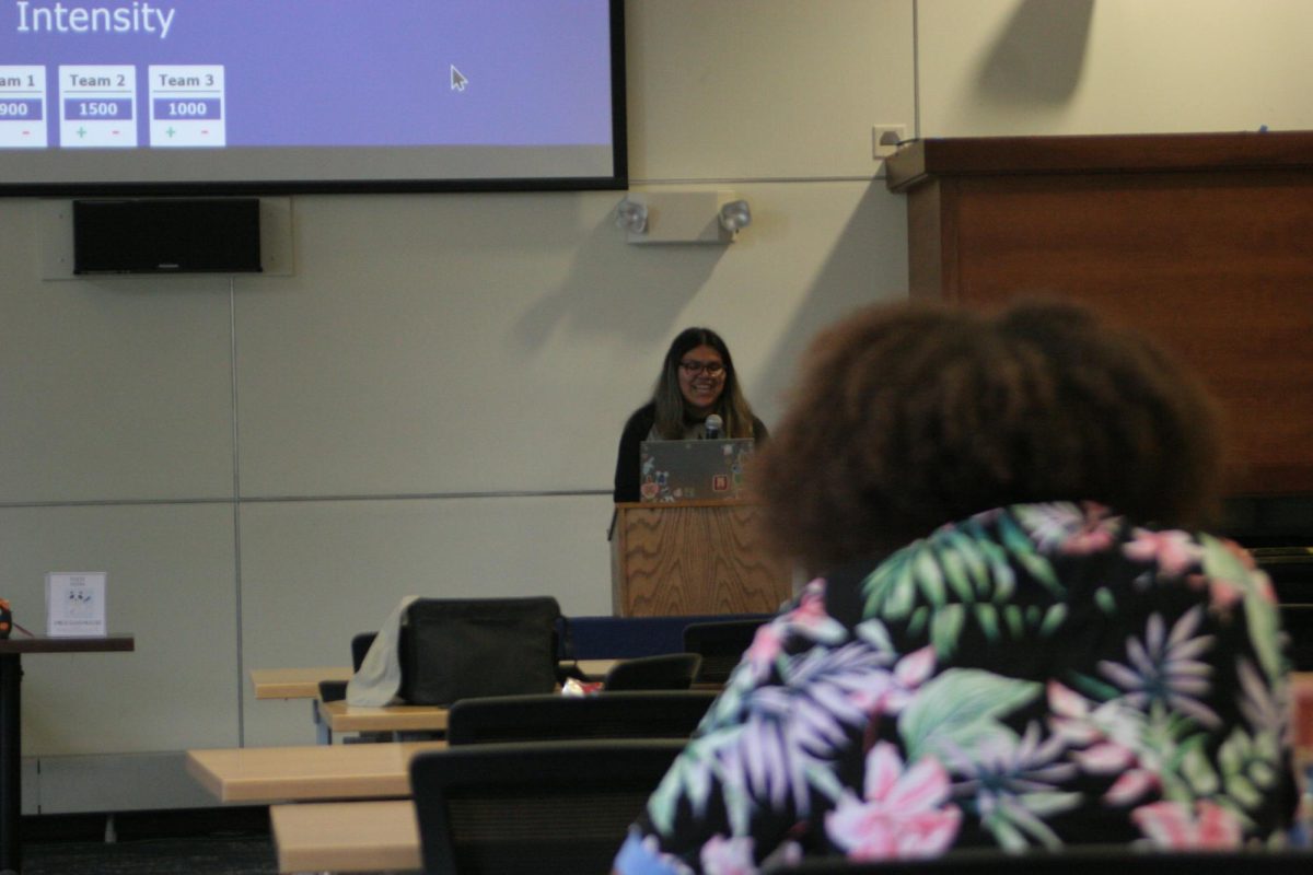 Evelyn Martinez, Access and Equity Peer Educator, leads a trivia round during “Are You Toxic?” at Lincoln Residence Hall on September 23, 2025.