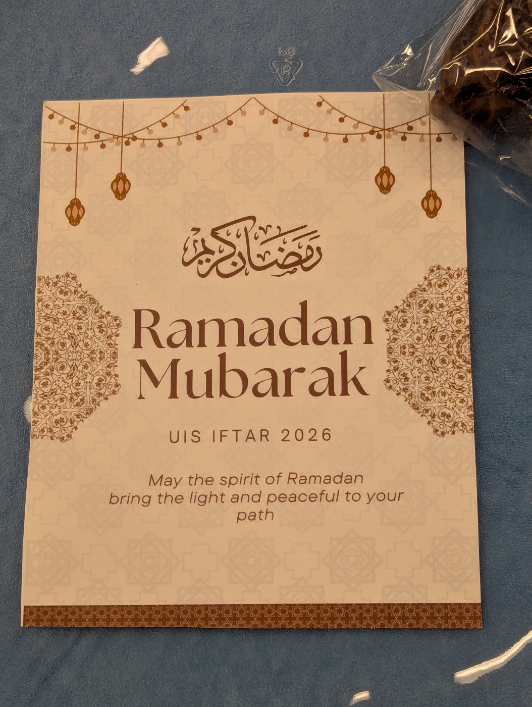 A card that was part of the table setting at the iftar.