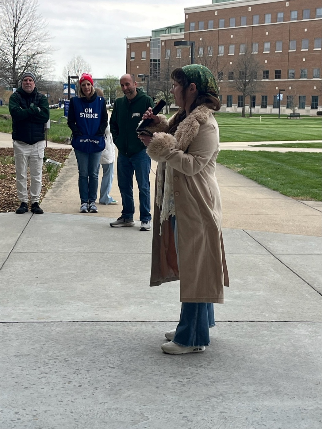 [Mikayla Rodgers speaking on campus in support of striking UIS faculty.] 