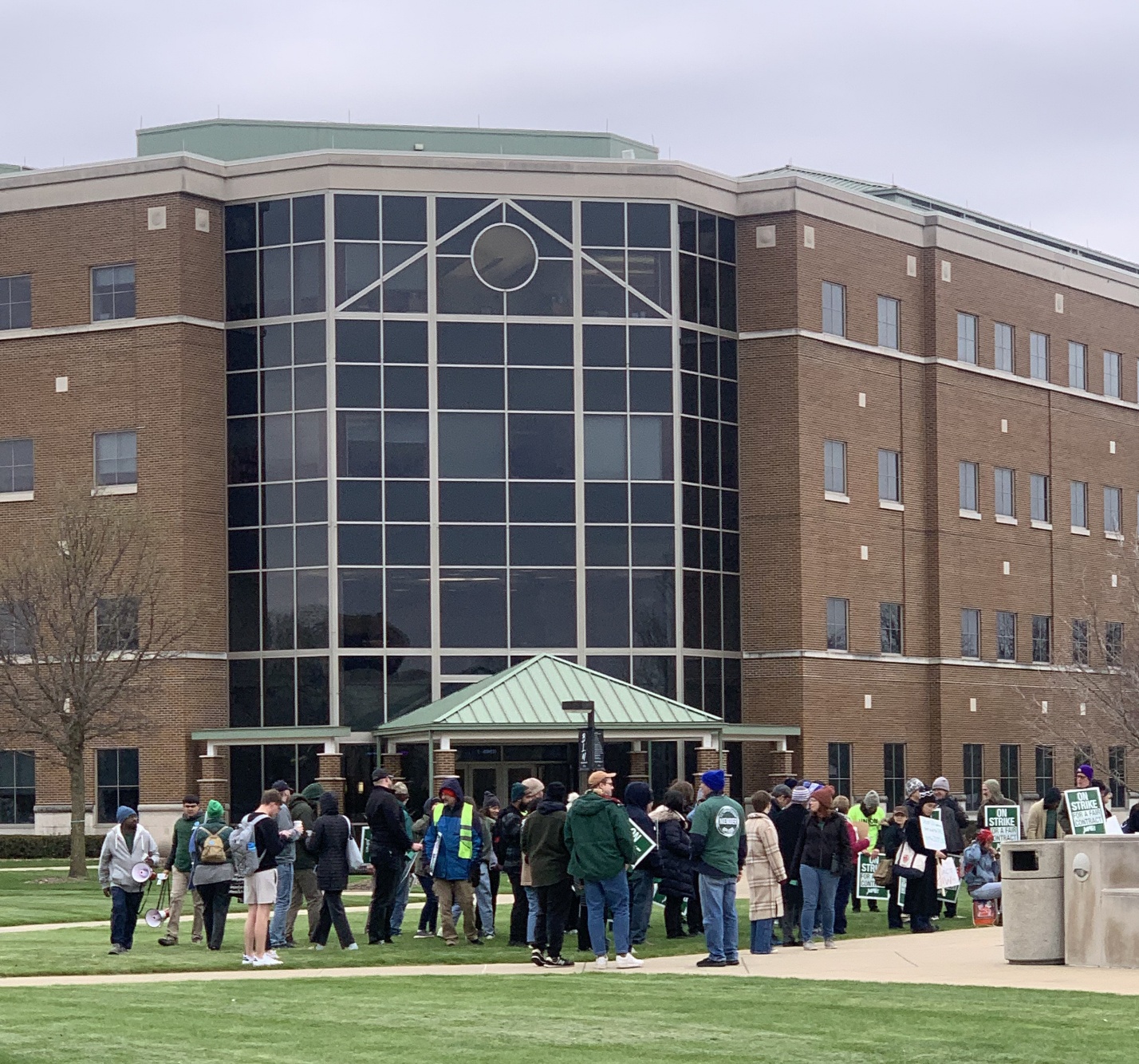 Striking faculty, students, and other supporters gathered in front of University Hall Building on Tuesday, April 7. 